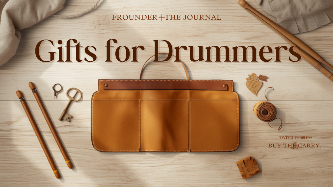 Gifts for drummers — a Frounder caramel full-grain leather drumstick bag open on a workbench with drumsticks, a brass drum key and felts