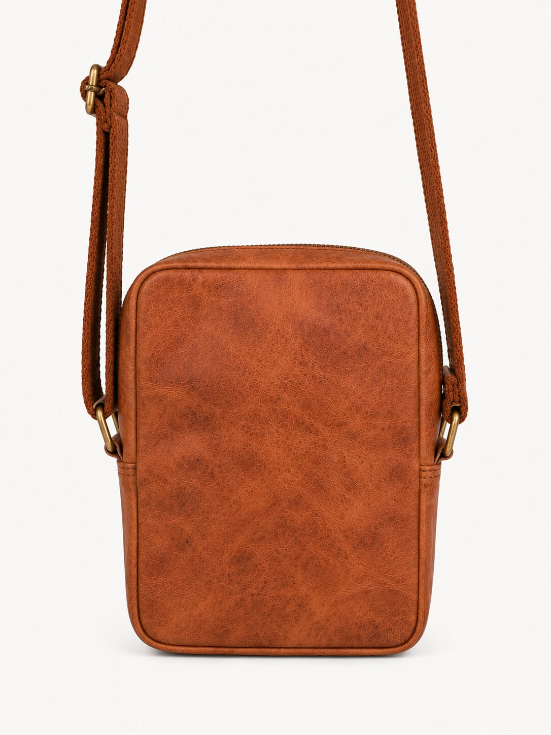 Brown leather crossbody bag on a white background