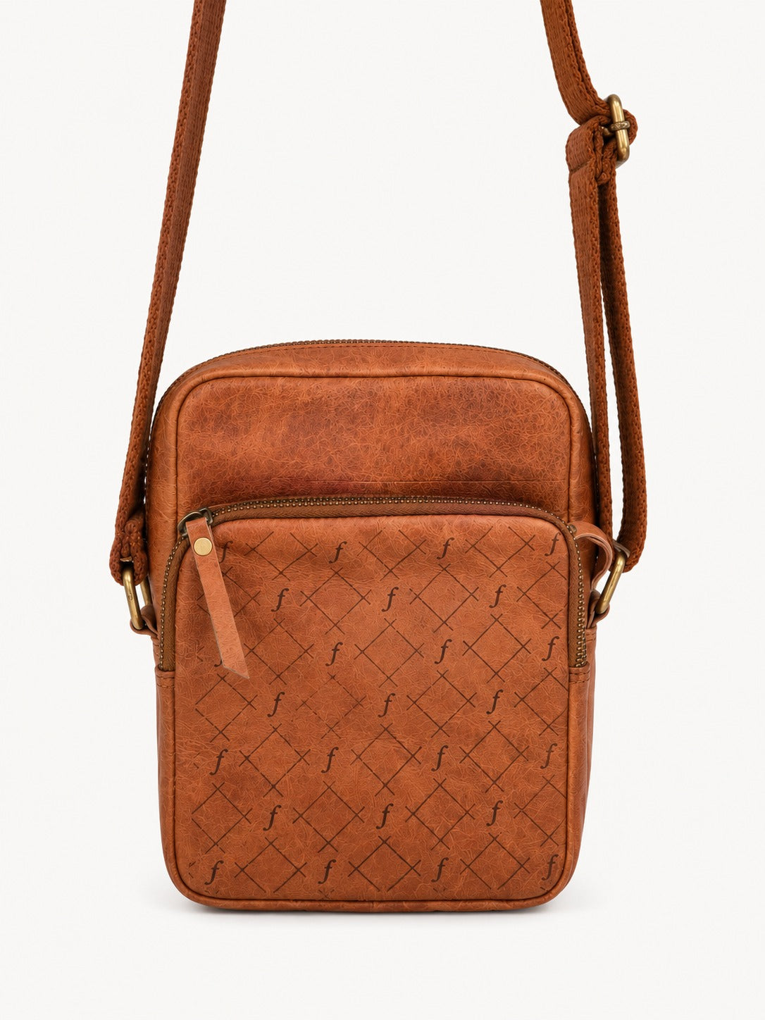 Brown leather crossbody bag with woven pattern on a white background