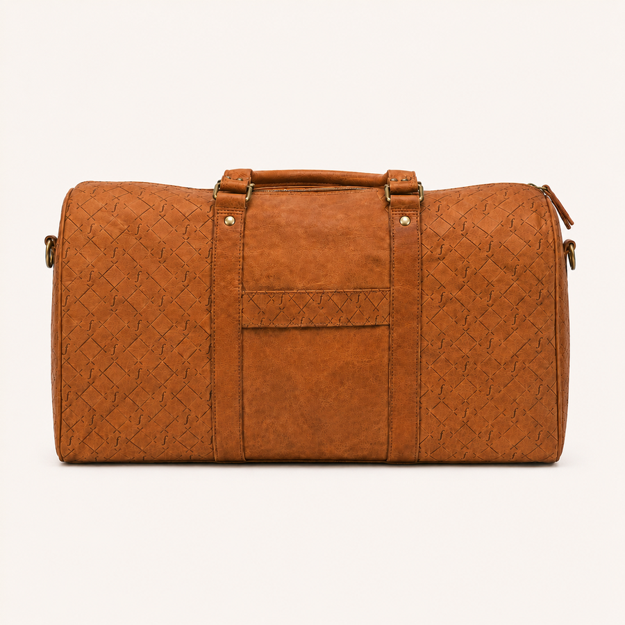 Frounder Orion full-grain leather duffel, three-quarter view with the top zip closed