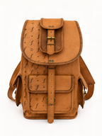 Brown leather backpack with decorative patterns on a white background