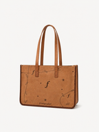 Frounder Nova Tote premium leather front view with botanical monogram