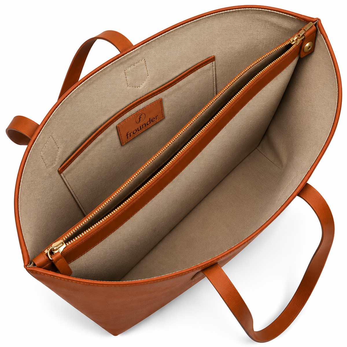The Altair tote open, showing the cotton lining, an interior zip pocket and the Frounder patch stitched to the lining.