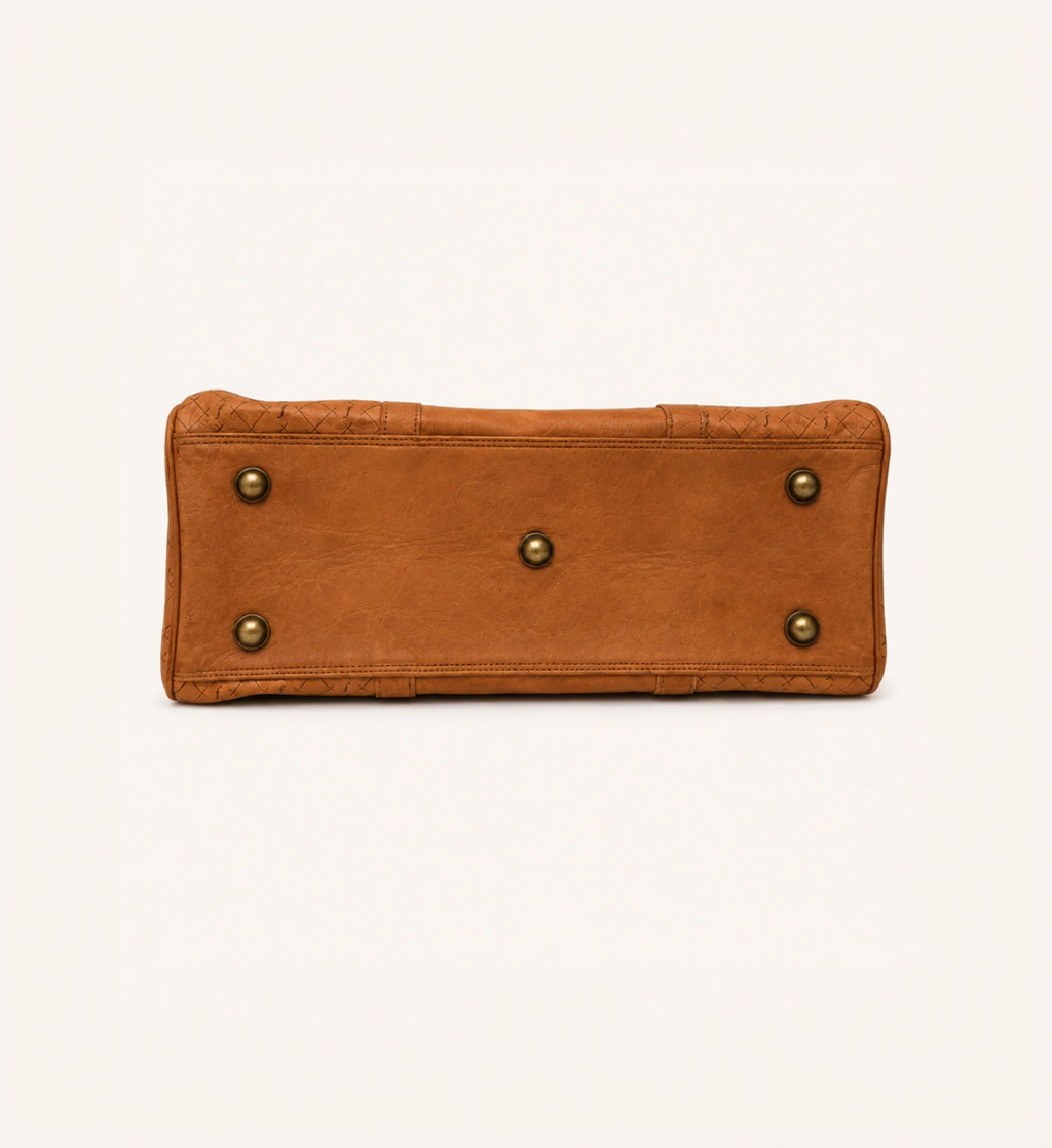 Close detail of the solid brass buckles and studs on the Frounder Jupiter duffel