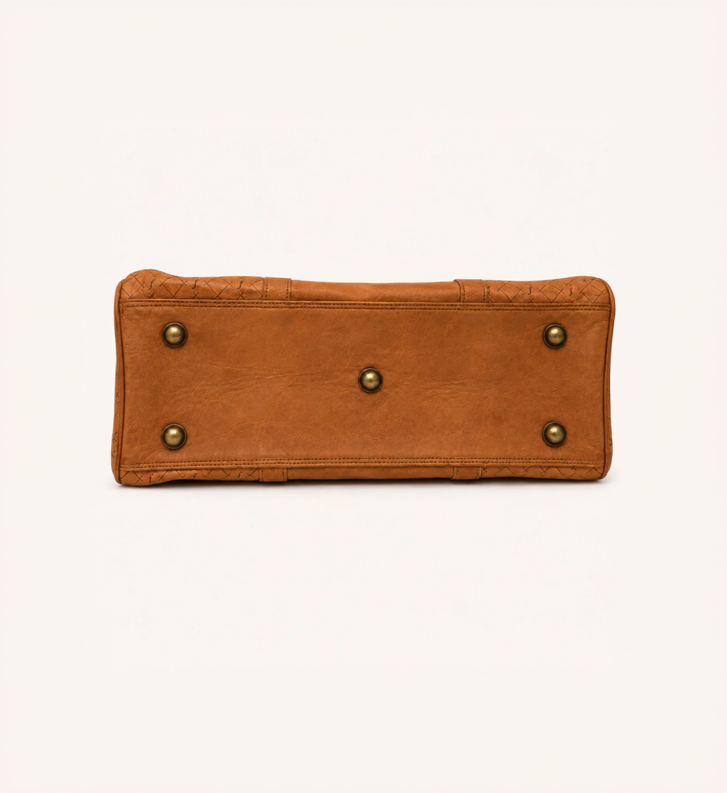 Close detail of the solid brass buckles and studs on the Frounder Jupiter duffel