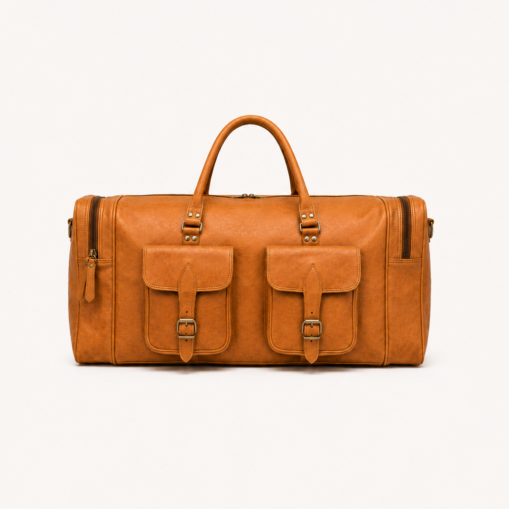 A tan leather duffel bag with two top handles, two front flap pockets with buckle details, and side zipper pockets, shown against a plain off-white background.