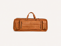 Frounder Solstice full-grain leather rifle bag in brown, with a top handle, zippered pockets and a quilted centre panel