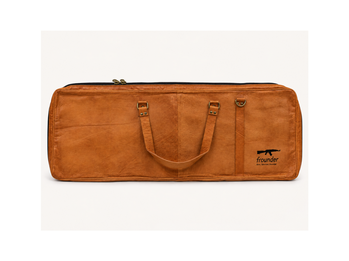 Frounder Solstice leather rifle case shown full length, with dual reinforced top handles and a full-length zip closure